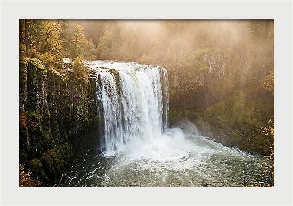 Majestic Waterfall In Mist