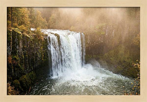 Majestic Waterfall In Mist