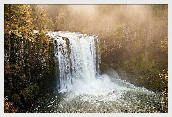 Majestic Waterfall In Mist