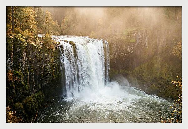 Majestic Waterfall In Mist