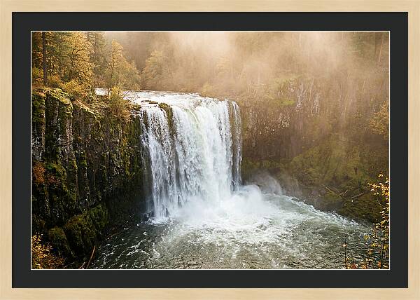 Majestic Waterfall In Mist