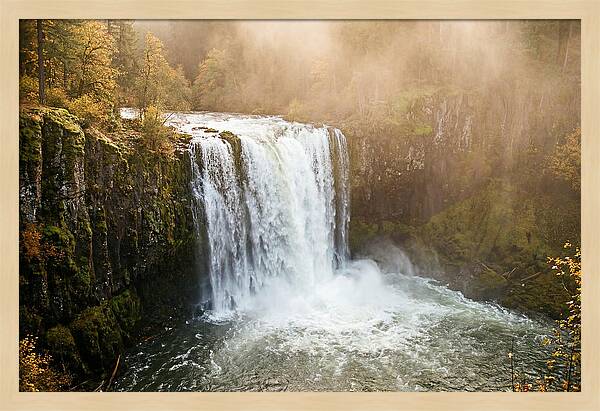 Majestic Waterfall In Mist