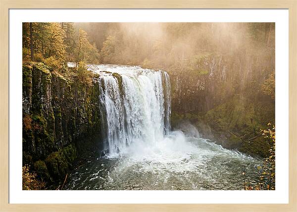 Majestic Waterfall In Mist