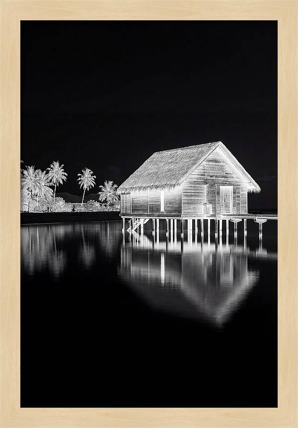 Maldivian Overwater Bungalow At Dusk