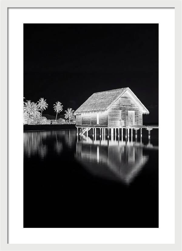 Maldivian Overwater Bungalow At Dusk