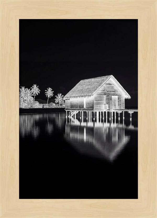 Maldivian Overwater Bungalow At Dusk