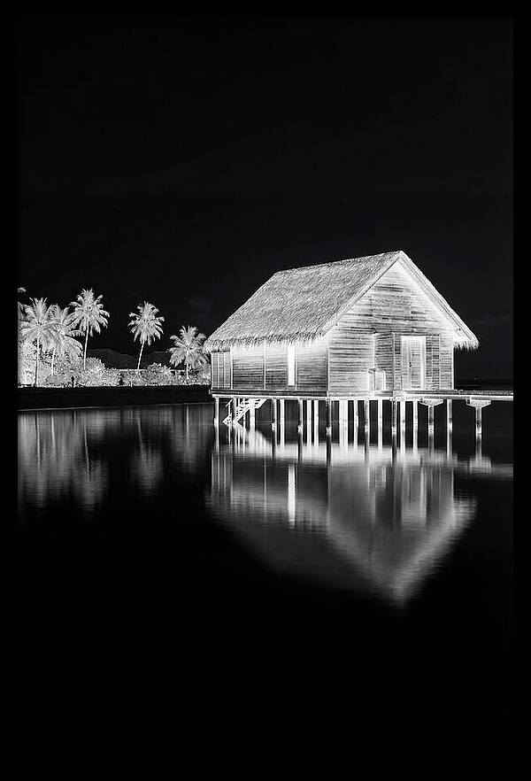 Maldivian Overwater Bungalow At Dusk