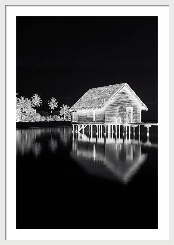 Maldivian Overwater Bungalow At Dusk