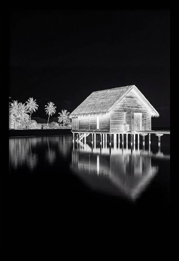 Maldivian Overwater Bungalow At Dusk