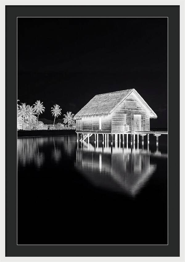 Maldivian Overwater Bungalow At Dusk