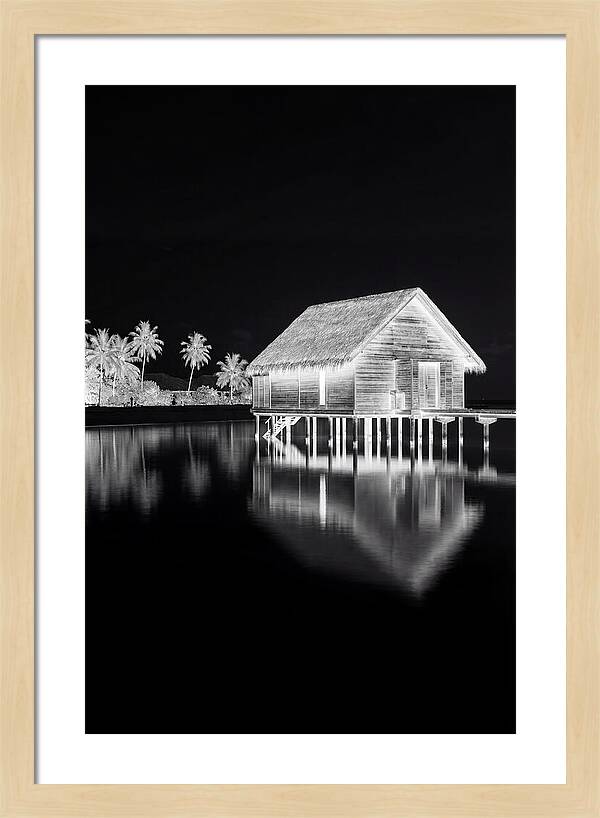 Maldivian Overwater Bungalow At Dusk