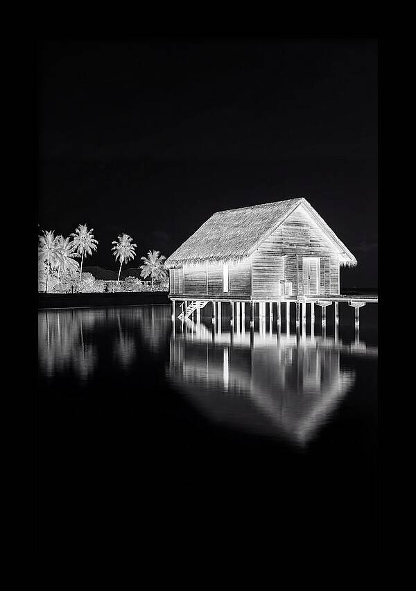 Maldivian Overwater Bungalow At Dusk