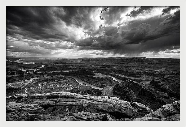 Mesa Arch Overlooking Canyon