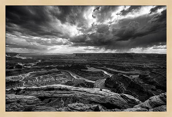 Mesa Arch Overlooking Canyon