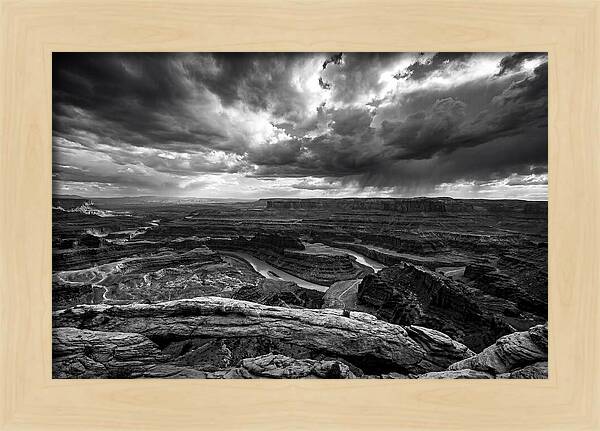 Mesa Arch Overlooking Canyon