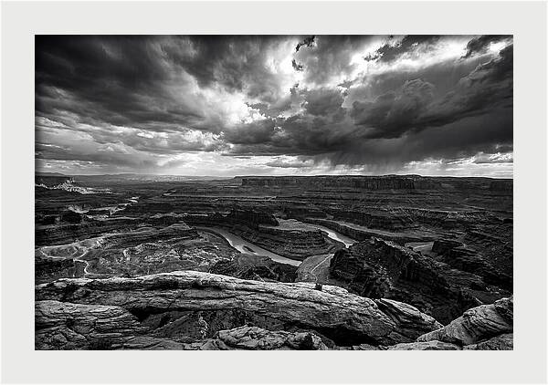 Mesa Arch Overlooking Canyon