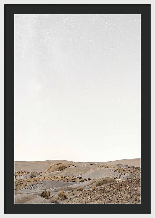 Meteor Shower Over Desert Landscape