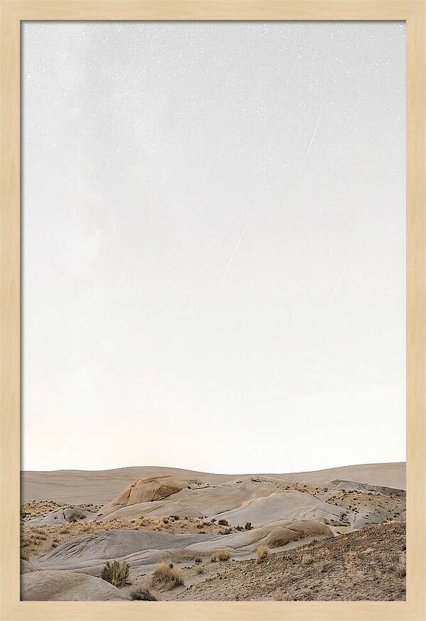 Meteor Shower Over Desert Landscape