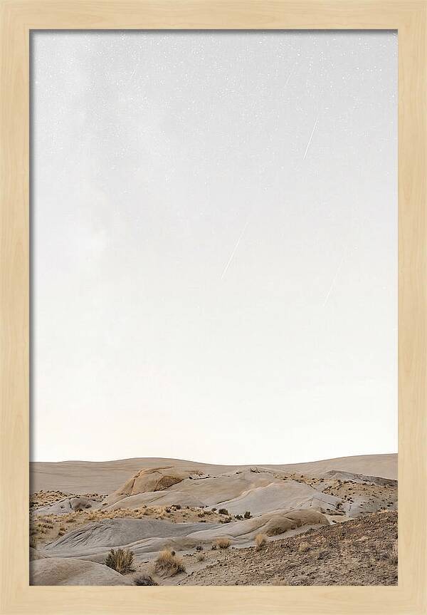 Meteor Shower Over Desert Landscape