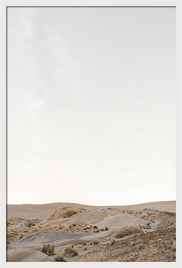 Meteor Shower Over Desert Landscape