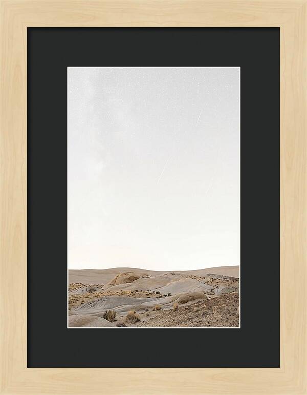 Meteor Shower Over Desert Landscape