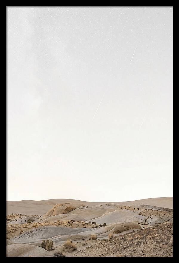 Meteor Shower Over Desert Landscape