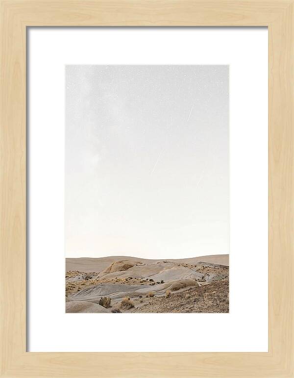 Meteor Shower Over Desert Landscape