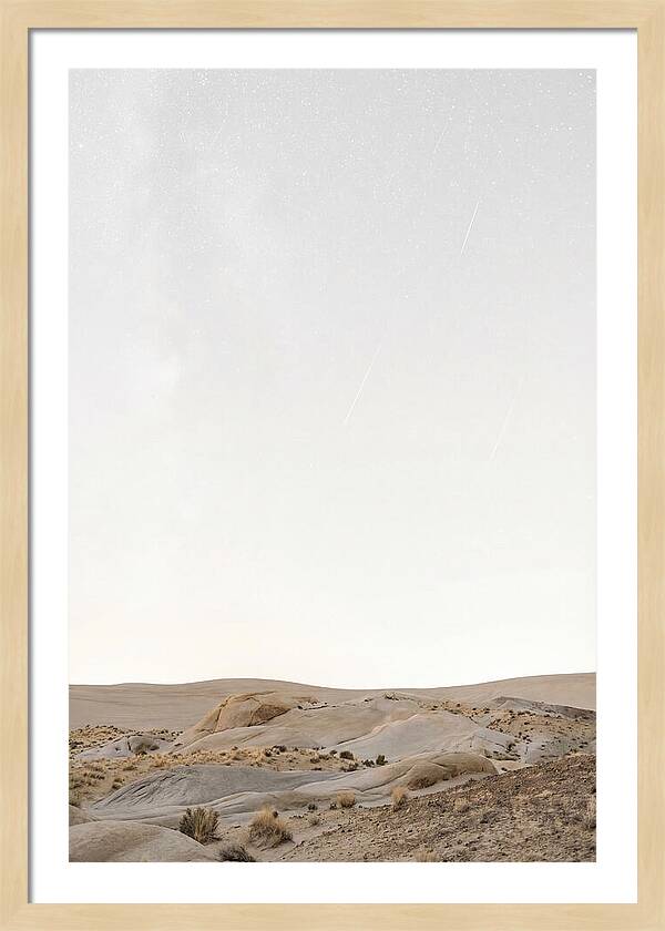 Meteor Shower Over Desert Landscape
