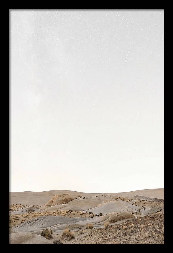 Meteor Shower Over Desert Landscape