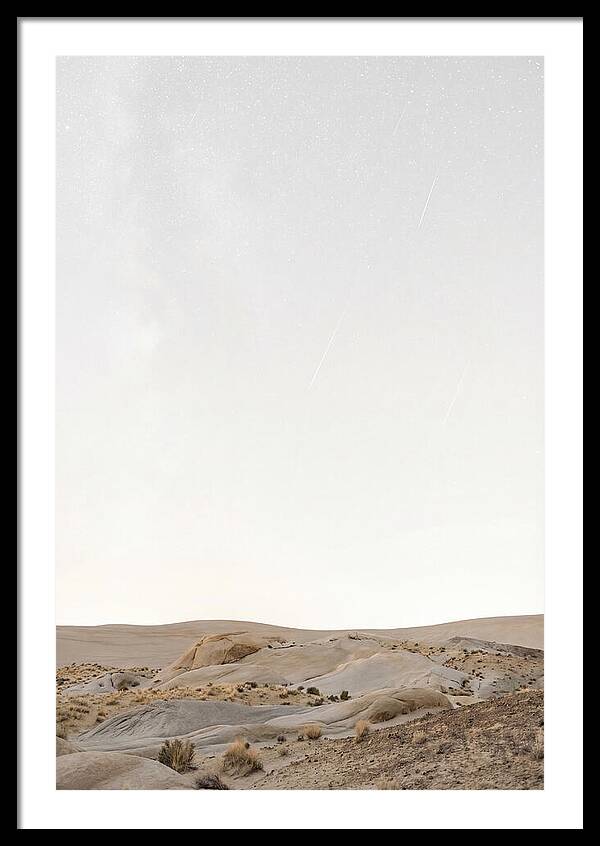 Meteor Shower Over Desert Landscape