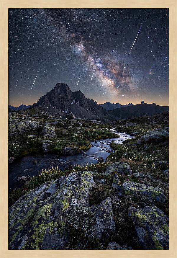 Meteor Shower Over Majestic Mountains