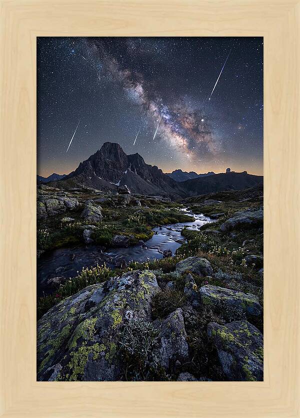 Meteor Shower Over Majestic Mountains