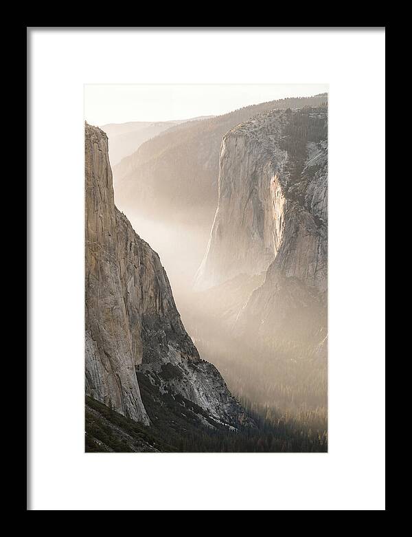 Misty Valley Between Towering Cliffs