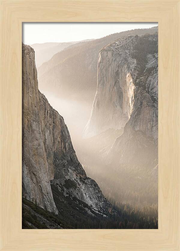 Misty Valley Between Towering Cliffs