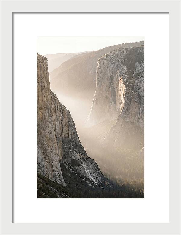Misty Valley Between Towering Cliffs