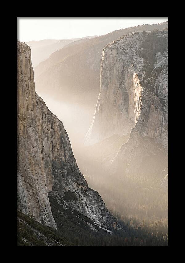 Misty Valley Between Towering Cliffs