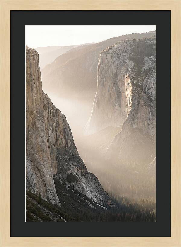 Misty Valley Between Towering Cliffs