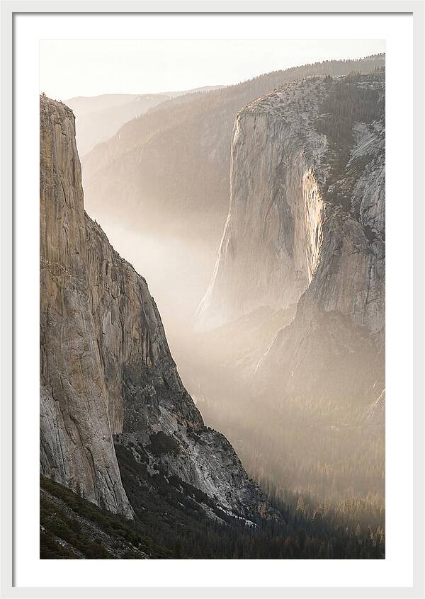 Misty Valley Between Towering Cliffs
