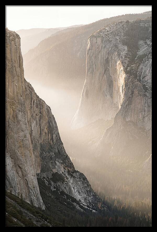 Misty Valley Between Towering Cliffs