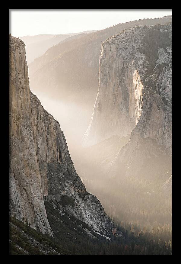 Misty Valley Between Towering Cliffs