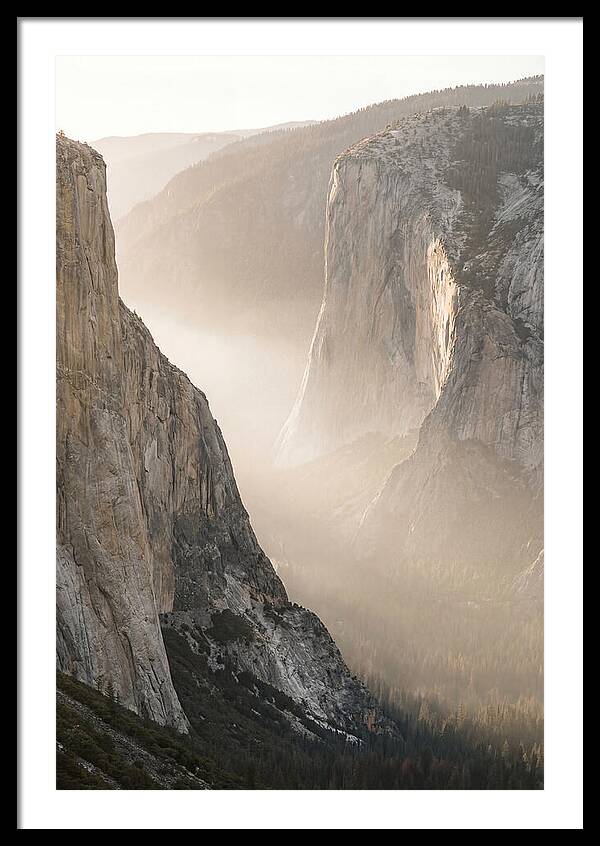 Misty Valley Between Towering Cliffs