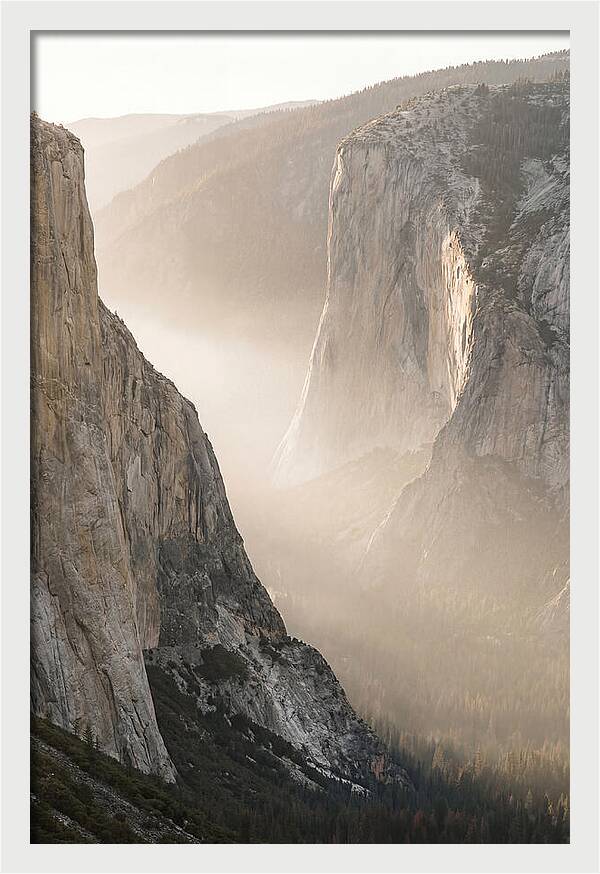 Misty Valley Between Towering Cliffs