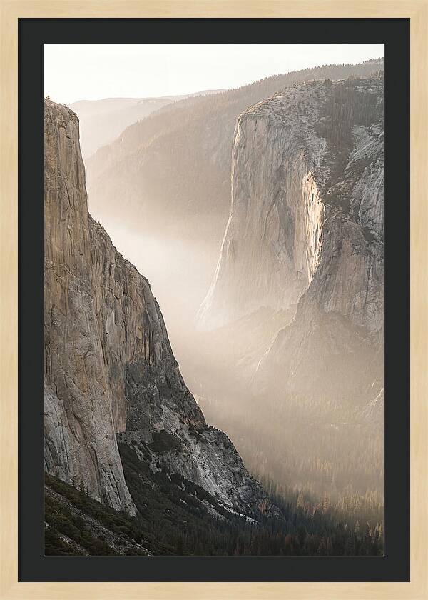 Misty Valley Between Towering Cliffs