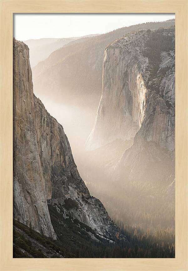 Misty Valley Between Towering Cliffs