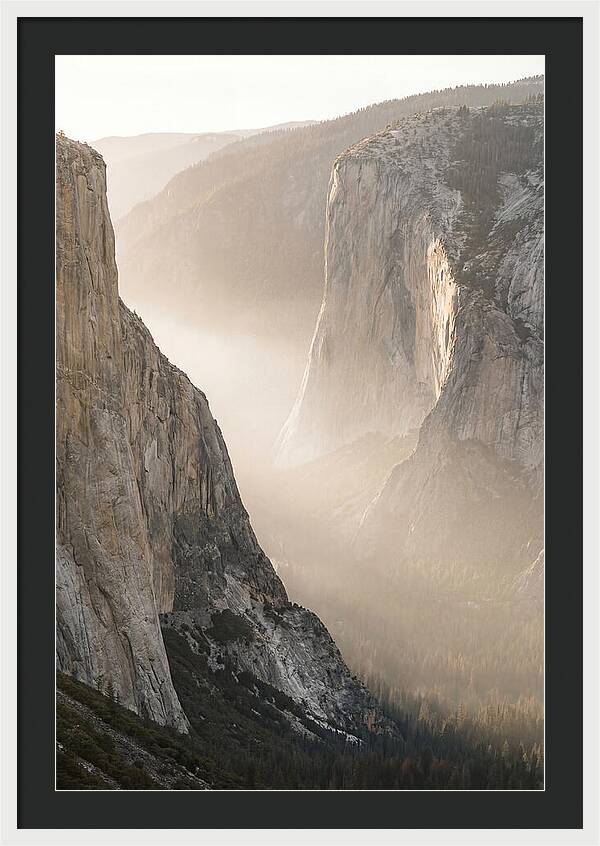 Misty Valley Between Towering Cliffs