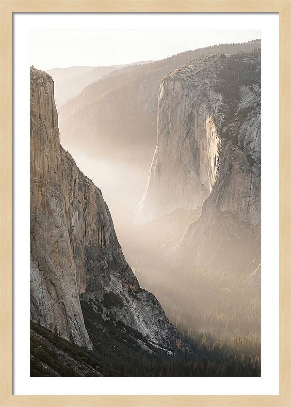 Misty Valley Between Towering Cliffs