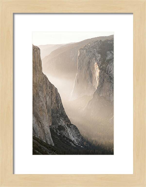 Misty Valley Between Towering Cliffs