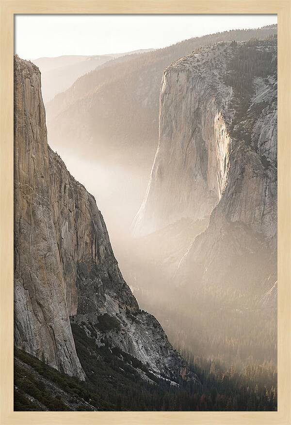 Misty Valley Between Towering Cliffs
