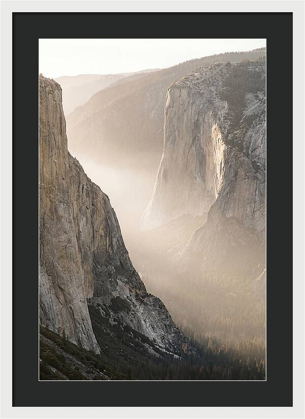 Misty Valley Between Towering Cliffs