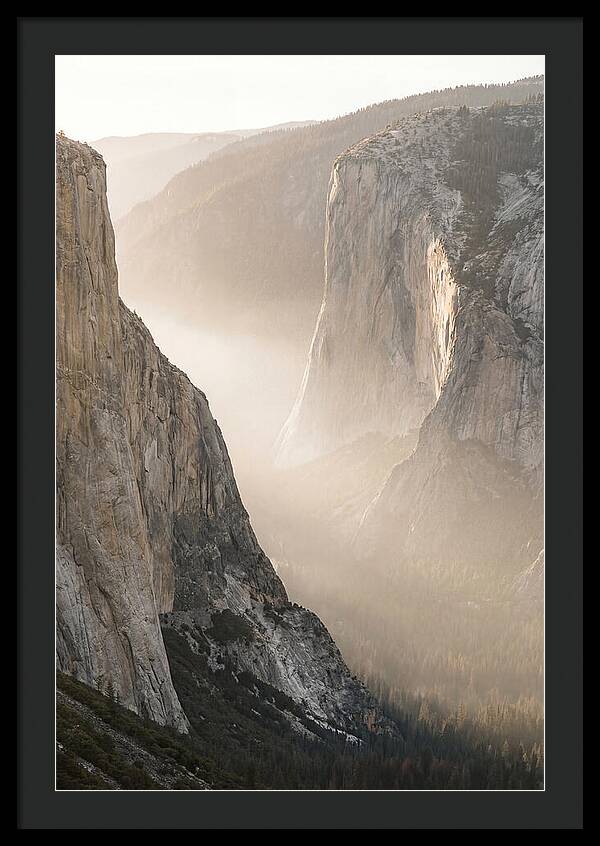 Misty Valley Between Towering Cliffs